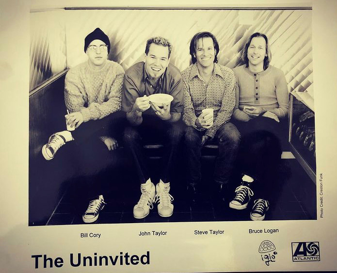 A promotional picture of the four original members of The Uninvited from their self-titled 1997 Atlantic Records album